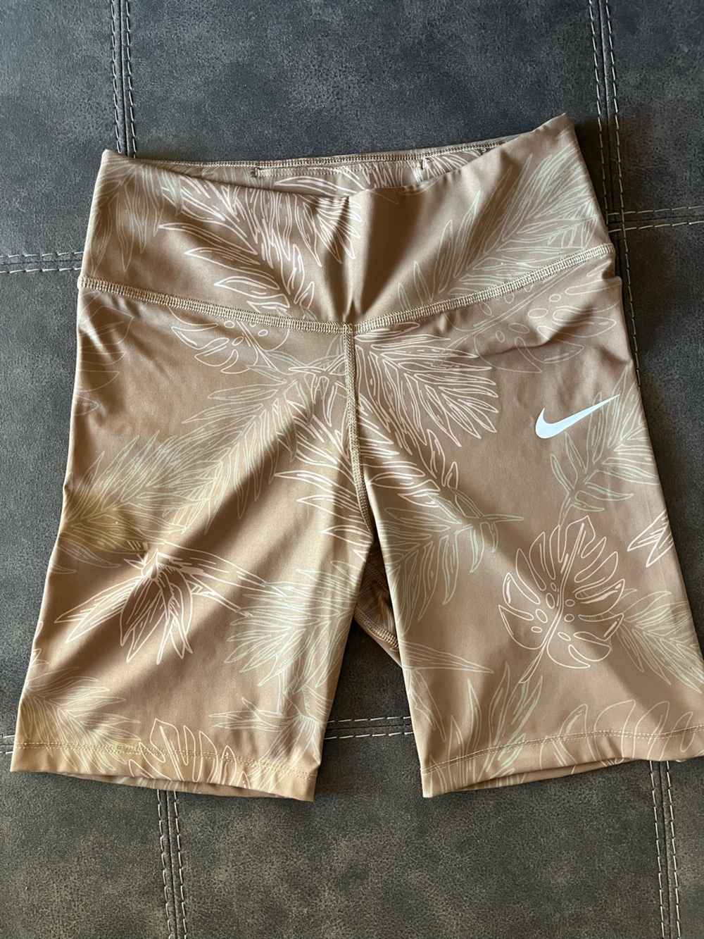 Nike Women’s Tan Leaf-Print Bike Shorts with White Swoosh